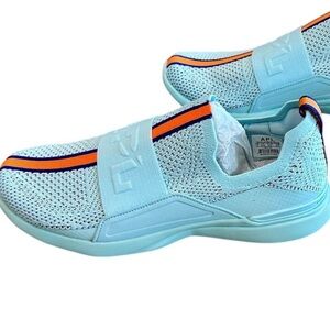 APL Women’s TechLoom Bliss Slip-On Sneakers — Light Blue with Orange Accent